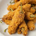 A Plate of perfectly fried Chiles Rellenos.
