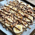 Frozen peanut butter banana yogurt bark with chocolate and banana