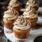 Delicious White Russian Cupcakes topped with creamy frosting and a coffee flavor