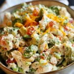 Jalapeno Popper Chicken Salad with Cottage Cheese in a bowl garnished with herbs