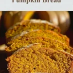 Freshly baked pumpkin bread sliced and garnished with spices