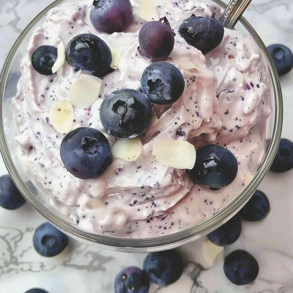 Delicious easy blueberry cheesecake fluff dessert served in a bowl