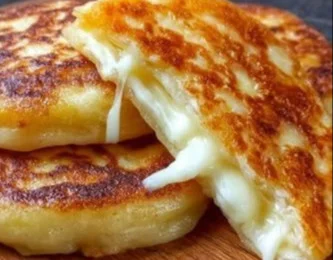 Crispy Korean Cheese Pancake served with dipping sauce