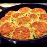 Delicious cottage cheese skillet biscuits served with butter and herbs.