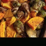 Colorful fall sheet pan meal with roasted vegetables and chicken
