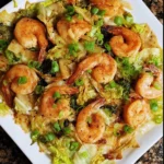 Garlic Butter Fried Cabbage and Shrimp served on a plate